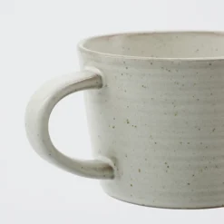 Tasse Steingut mit Unterteller